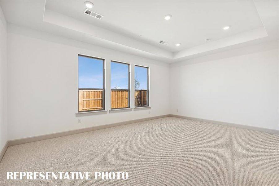 Your dreamy new owner's suite is located at the rear of the home for additional privacy.  REPRESENTATIVE PHOTO