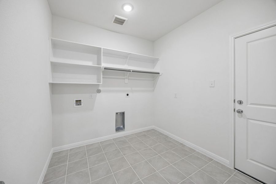Utility Room in the Magnolia home plan by Trophy Signature Homes – REPRESENTATIVE PHOTO