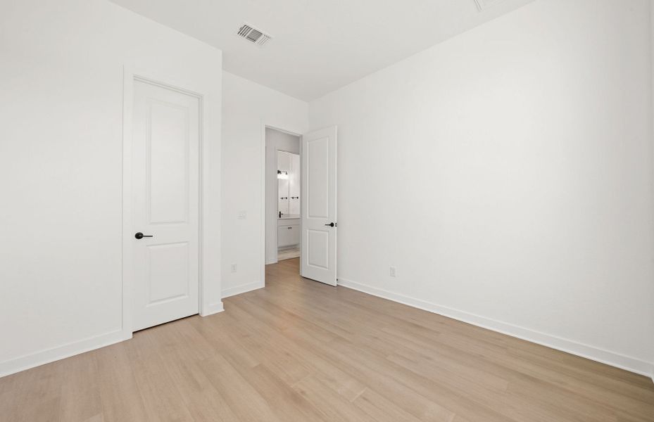 Representative unfurnished interior of a home built from the Dobbin by Pulte Homes in 6 Creeks, Kyle (Image 25).