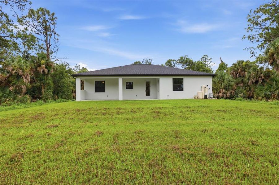 Exterior details and patio area of a home in , Port Charlotte (Image 3).