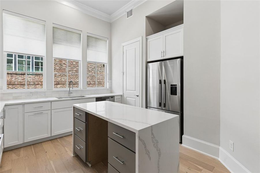 Image of model home with similar floorplan.
