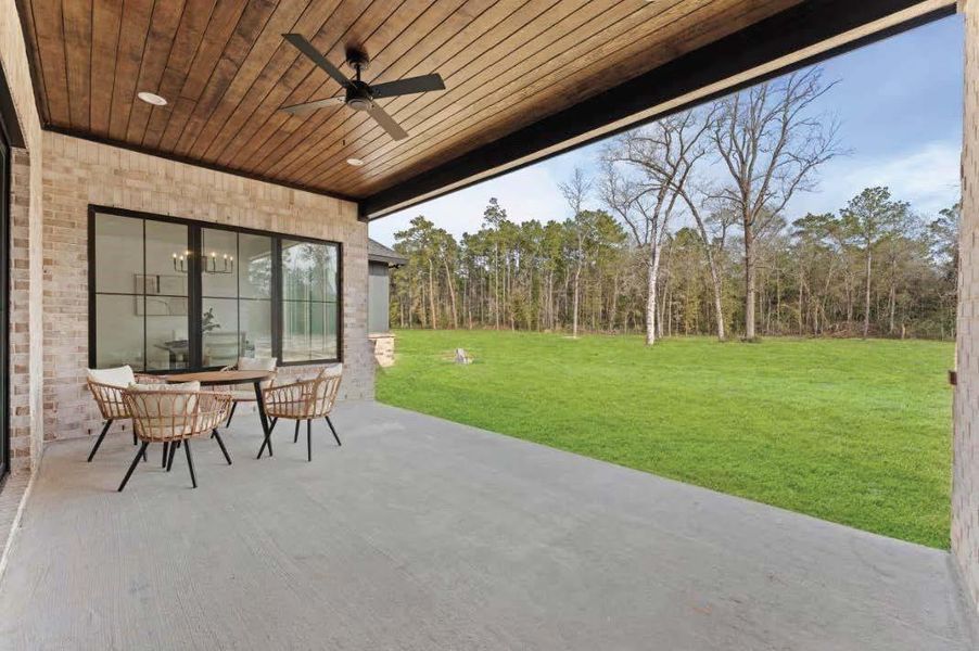 Exterior details and patio area of a home in , Conroe (Image 3).