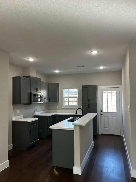 Furnished interior view inside a new home in , Conroe (Image 6).