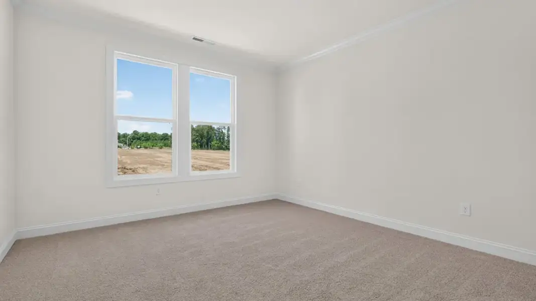 Spacious, unfurnished interior of a new home in Madden West, Fuquay Varina (Image 29).