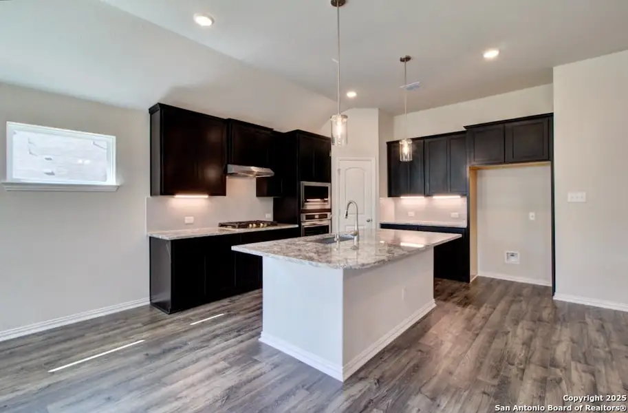 Furnished interior view inside a new home in Veranda, San Antonio (Image 9).