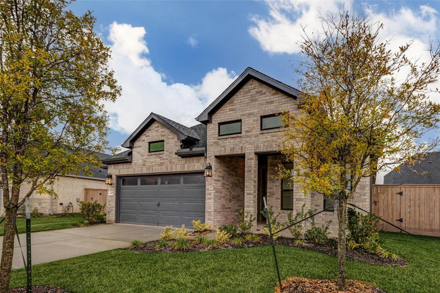 Front exterior of a new home in Katy Court, Katy, TX, highlighting curb appeal (Image 22).