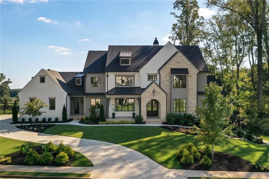 Front exterior of a new home in , Milton, GA, highlighting curb appeal (Image 26).