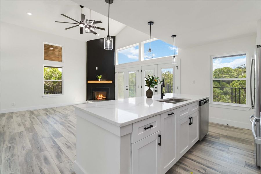 Modern, oversized ceiling fan complements the main living area for style and enhanced airflow. Modern, oversized ceiling fan complements the main living area for style and enhanced airflow.