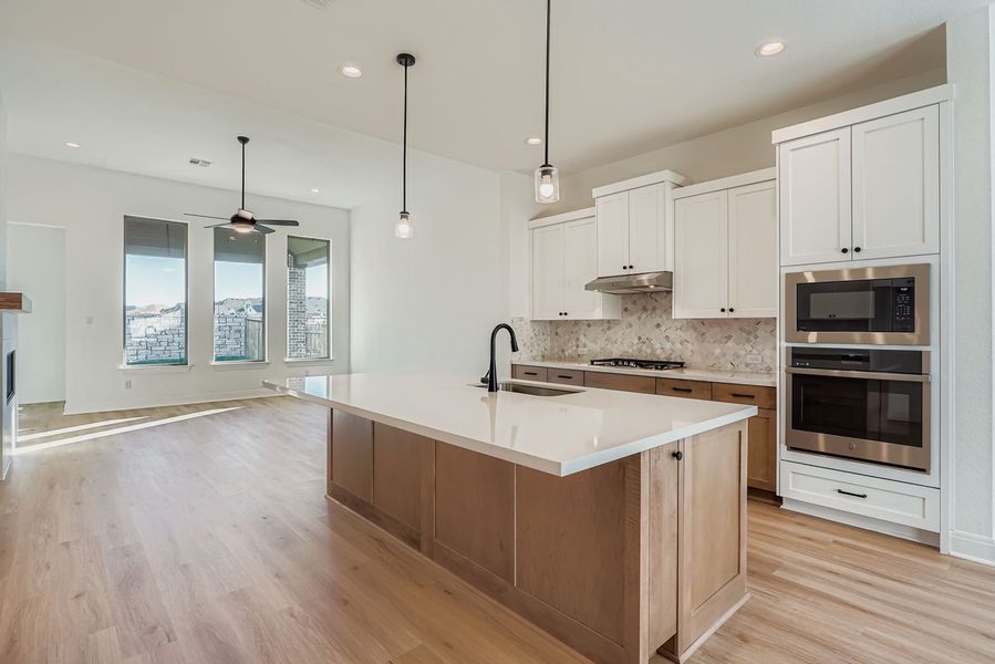 Furnished interior view inside a new home in 6 Creeks, Kyle (Image 3).