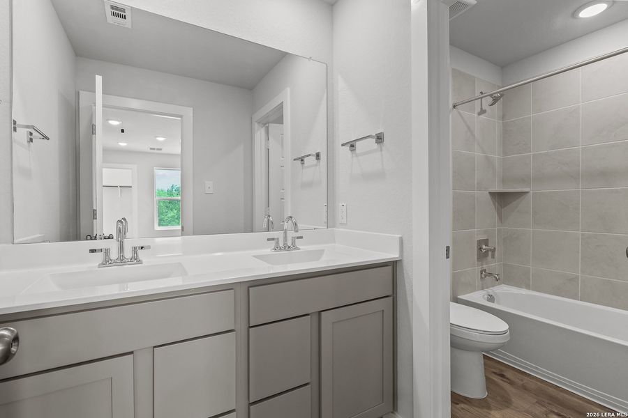 Furnished interior view inside a new home in Spring Creek, San Antonio (Image 13).