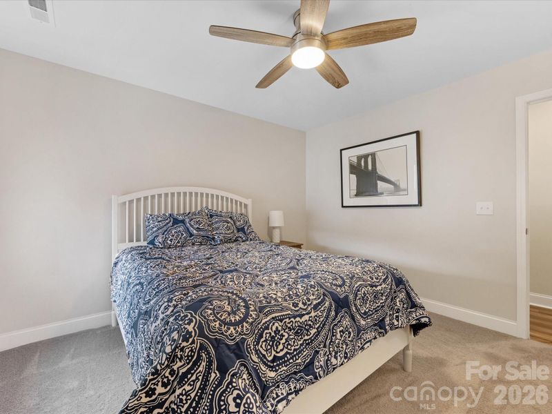 Furnished interior view inside a new home in Towns at Rea Colony, Charlotte (Image 18).