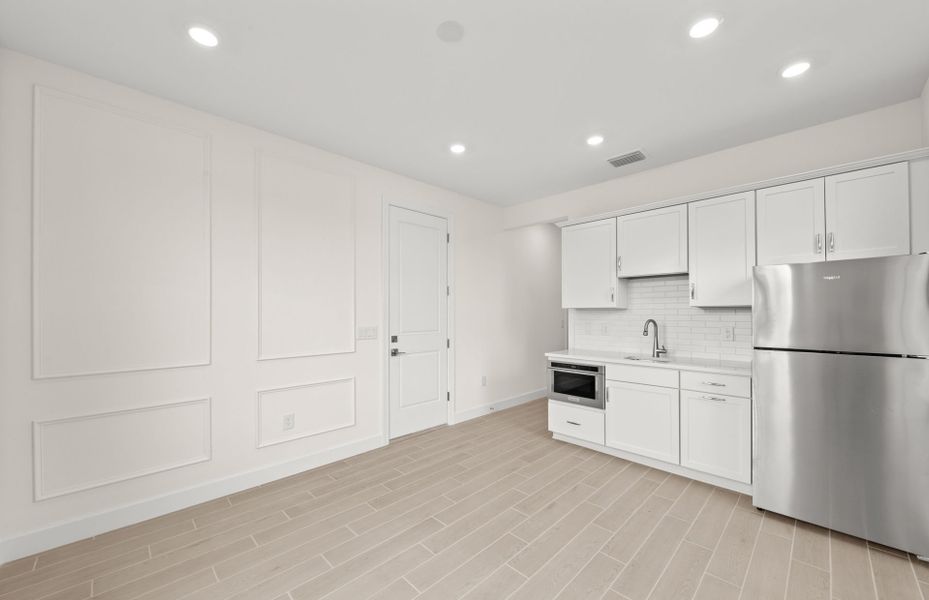 Representative furnished interior of a home built from the Concord by DiVosta in Talon Preserve on Palmer Ranch, Nokomis (Image 10).