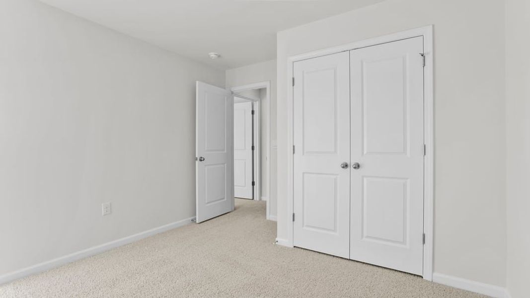 Spacious, unfurnished interior of a new home in Village Grove, Greenville (Image 26).