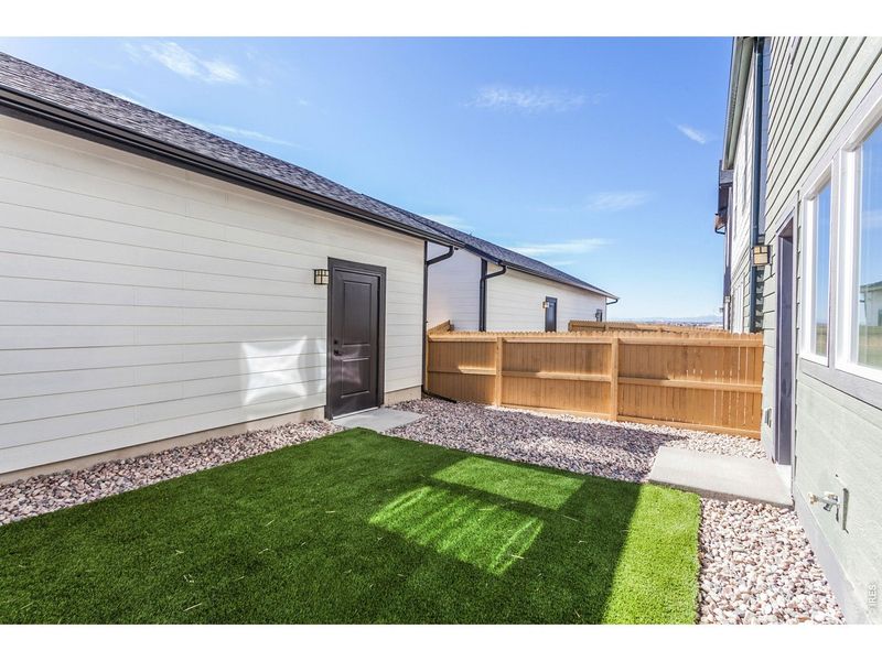 Exterior details and patio area of a home in Prairie Song Cottages, Windsor (Image 24).