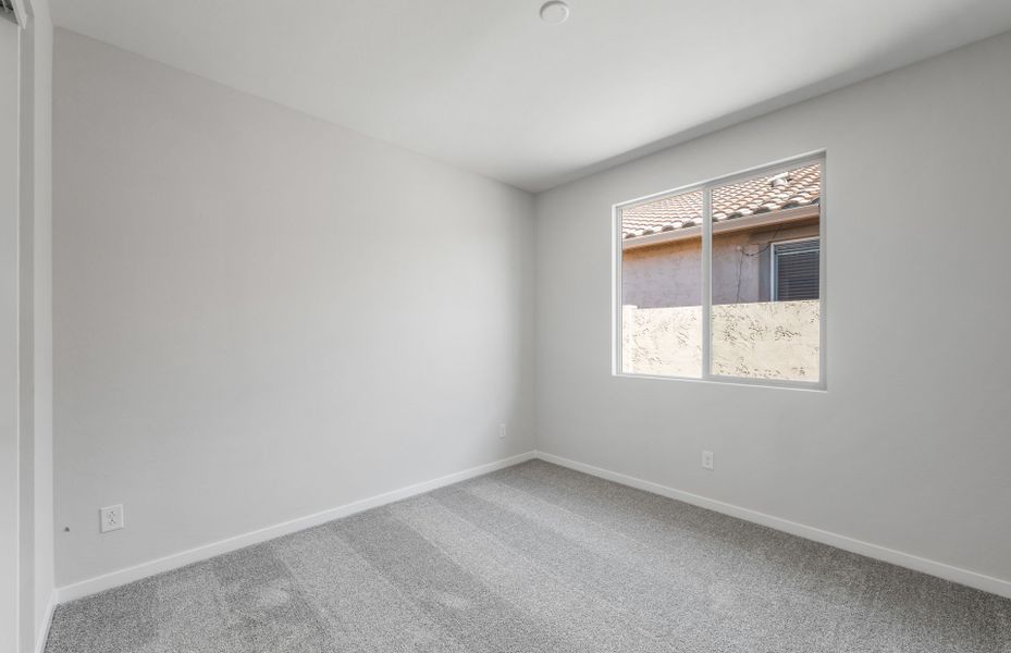 Spacious, unfurnished interior of a new home in Blossom Rock, Apache Junction (Image 22).