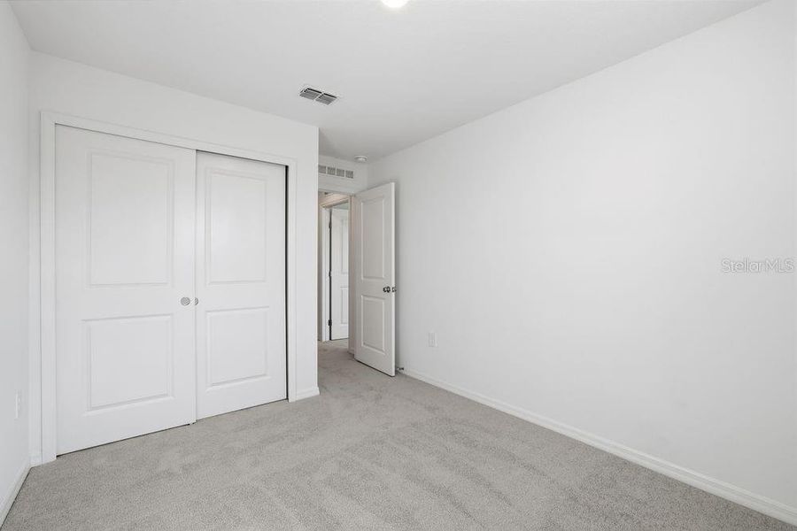 Spacious, unfurnished interior of a new home in The Towns at Firethorn, Parrish (Image 33).