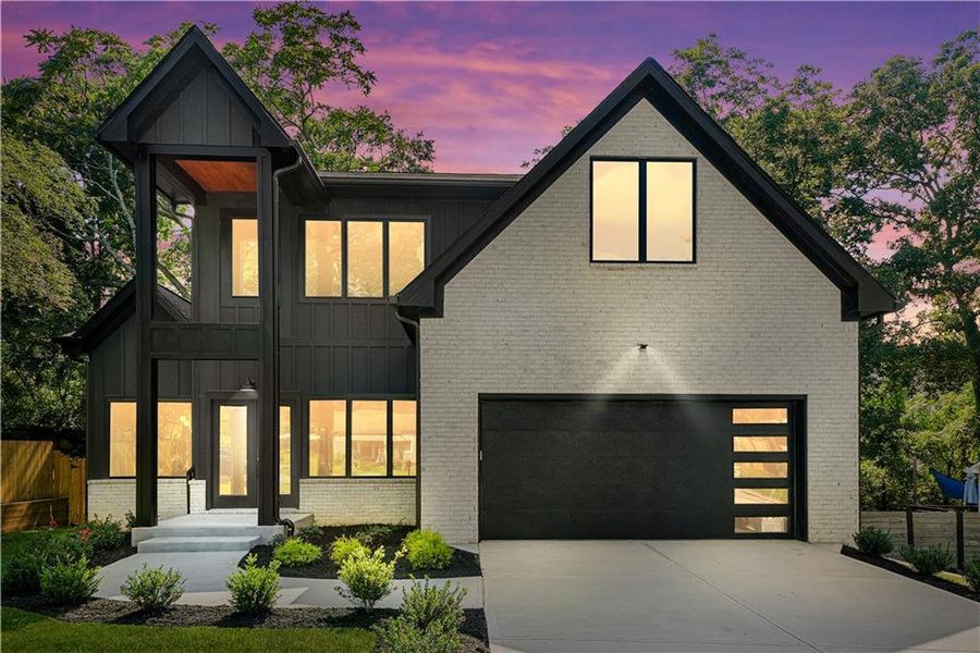 Front exterior of a new home in , Scottdale, GA, highlighting curb appeal (Image 1). Front exterior of a new home in , Scottdale, GA, highlighting curb appeal (Image 1).