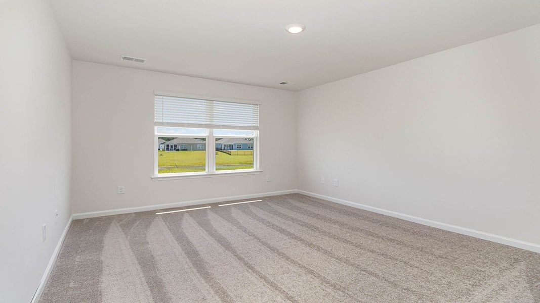 Representative unfurnished interior of a home built from the CALI by D.R. Horton in Heritage Crossing, Conway (Image 14).