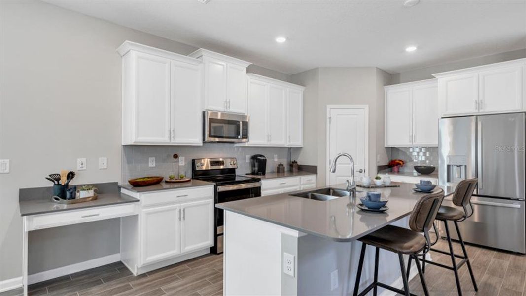 Furnished interior view inside a new home in Bridgewalk, St. Cloud (Image 12).
