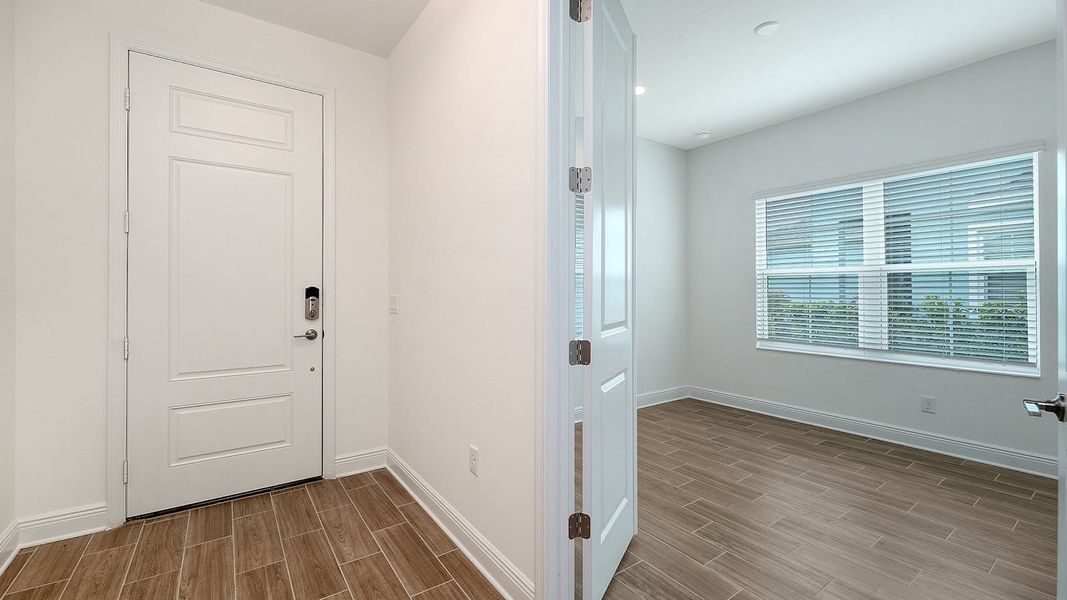 Spacious, unfurnished interior of a new home in Wildleaf Real Estate and Homes for Sale in Parrish, FL - Neal Communities, Parrish (Image 26). Spacious, unfurnished interior of a new home in Wildleaf Real Estate and Homes for Sale in Parrish, FL - Neal Communities, Parrish (Image 26).