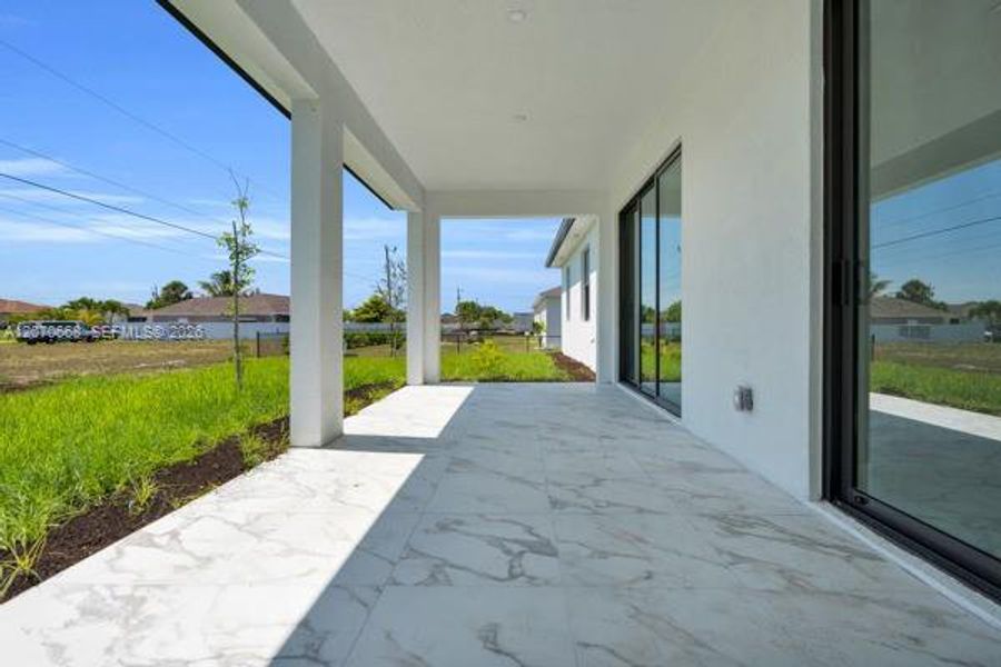 Exterior details and patio area of a home in , Cape Coral (Image 24).