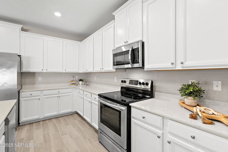 Furnished interior view inside a new home in Gentle Woods North, Jacksonville (Image 5).