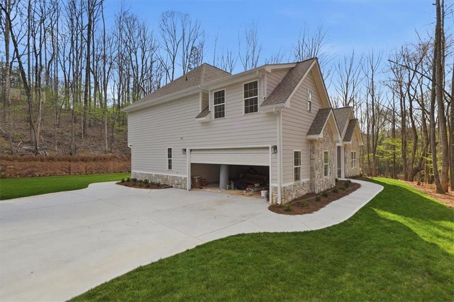 Front exterior of a new home in , Villa Rica, GA, highlighting curb appeal (Image 17).
