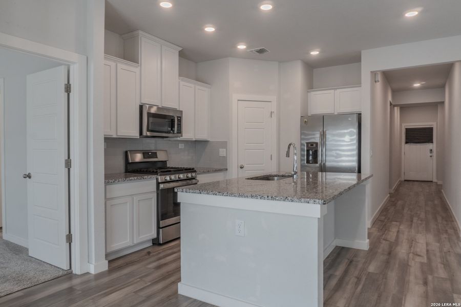 Furnished interior view inside a new home in The Meadows at Hunters Ranch, San Antonio (Image 13). Furnished interior view inside a new home in The Meadows at Hunters Ranch, San Antonio (Image 13).
