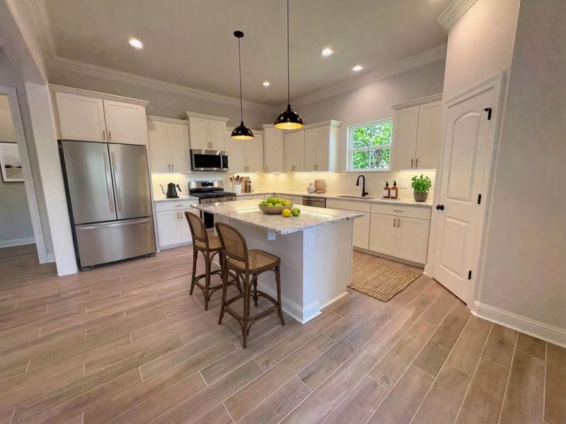 Front exterior of a new home in Longleaf, Lumberton, TX, highlighting curb appeal (Image 23).