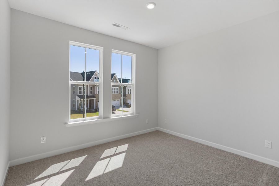 Spacious, unfurnished interior of a new home in Ovation at Sweetbrier, Durham (Image 25).