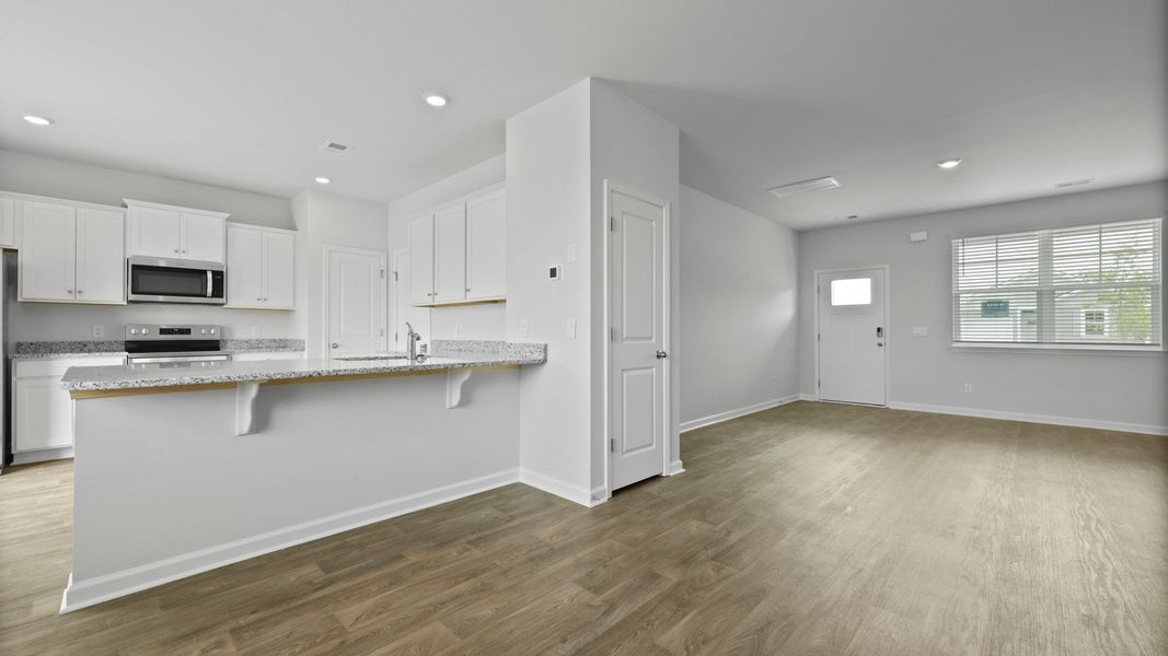 Representative furnished interior of a home built from the BRANDON by D.R. Horton in Hillcrest, Ravenel (Image 9).