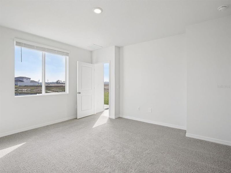 Spacious, unfurnished interior of a new home in Oakfield Trails - Premier Series, Parrish (Image 14).