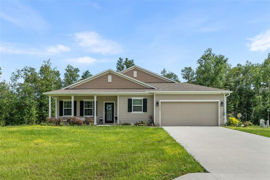 Front exterior of a new home in , Lake City, FL, highlighting curb appeal (Image 22). Front exterior of a new home in , Lake City, FL, highlighting curb appeal (Image 22).