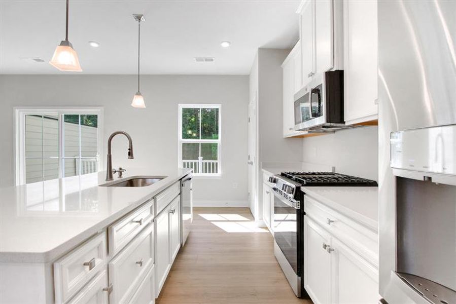 Furnished interior view inside a new home in Park Ridge at Sugar Hill, Sugar Hill (Image 5). Furnished interior view inside a new home in Park Ridge at Sugar Hill, Sugar Hill (Image 5).