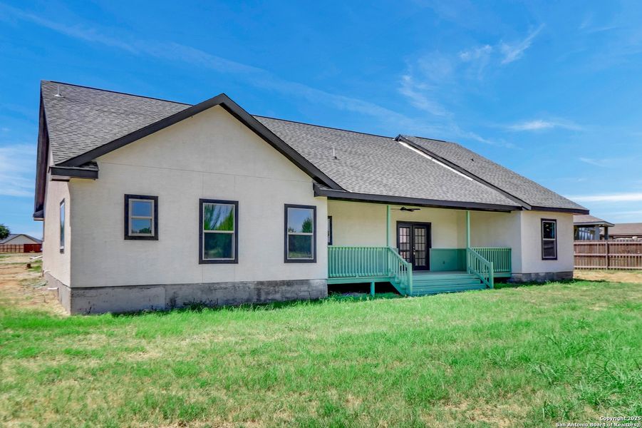 Front exterior of a new home in , Lytle, TX, highlighting curb appeal (Image 25). Front exterior of a new home in , Lytle, TX, highlighting curb appeal (Image 25).
