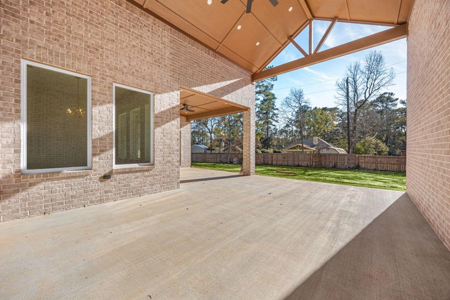 Exterior details and patio area of a home in , Magnolia (Image 4). Exterior details and patio area of a home in , Magnolia (Image 4).