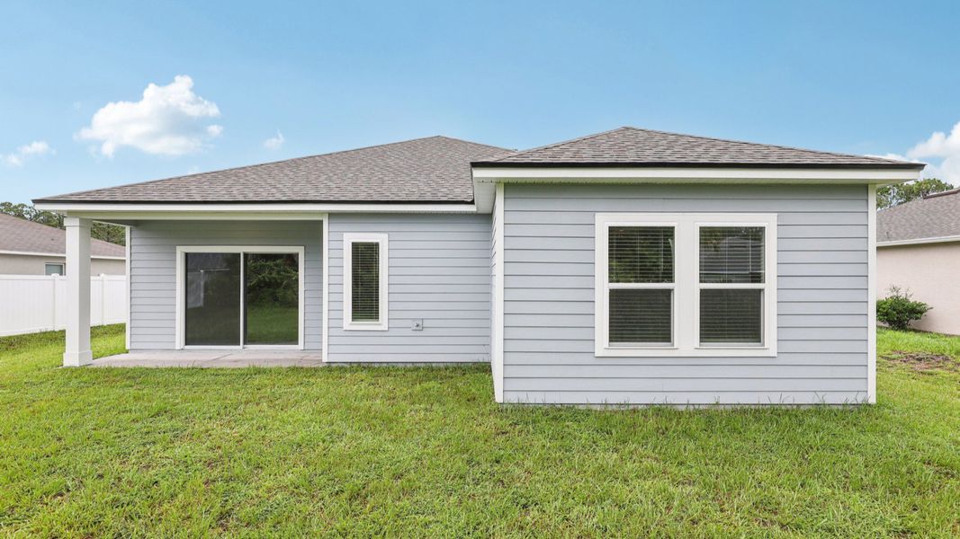 Exterior details and patio area of a home in Palm Coast, Palm Coast (Image 21).