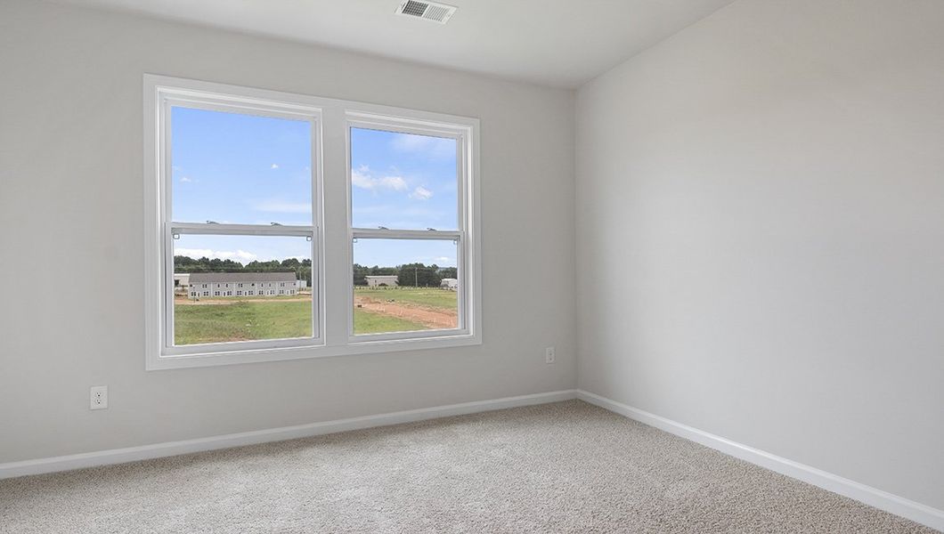 Spacious, unfurnished interior of a new home in Townes at Tap Root Farms, Fletcher (Image 13). Spacious, unfurnished interior of a new home in Townes at Tap Root Farms, Fletcher (Image 13).