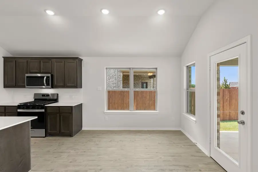 Front exterior of a new home in Northspur, Terrell, TX, highlighting curb appeal (Image 19).