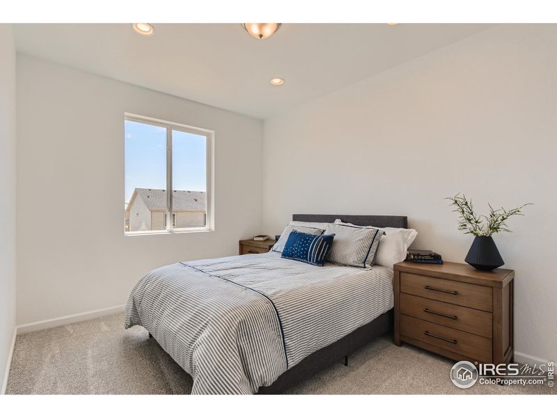 Third bedroom *Photo not of actual home, but same floorplan and style*