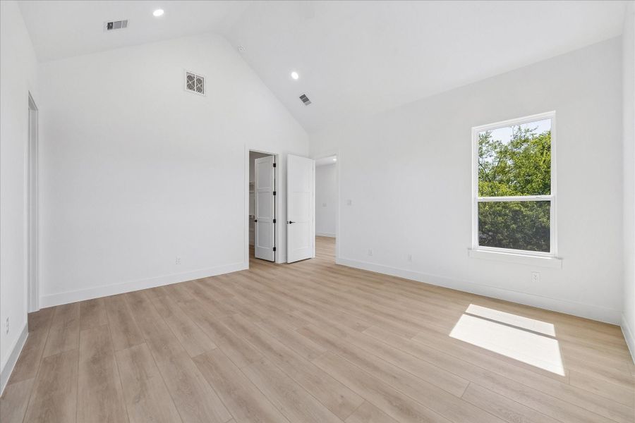 Spacious layout offers endless possibilities for furnishing, while the direct connection to the luxurious ensuite bath creates a true private retreat.