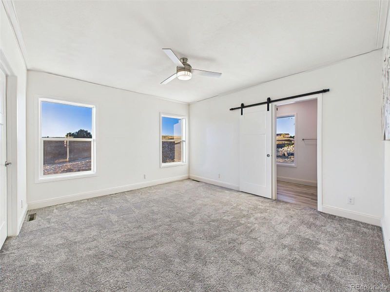 Un staged version showing clean lines, neutral tones, and dual windows for soft morning light. Un staged version showing clean lines, neutral tones, and dual windows for soft morning light.