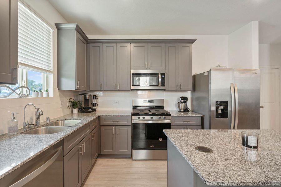 Furnished interior view inside a new home in Myrtle Gardens, Magnolia (Image 17). Furnished interior view inside a new home in Myrtle Gardens, Magnolia (Image 17).