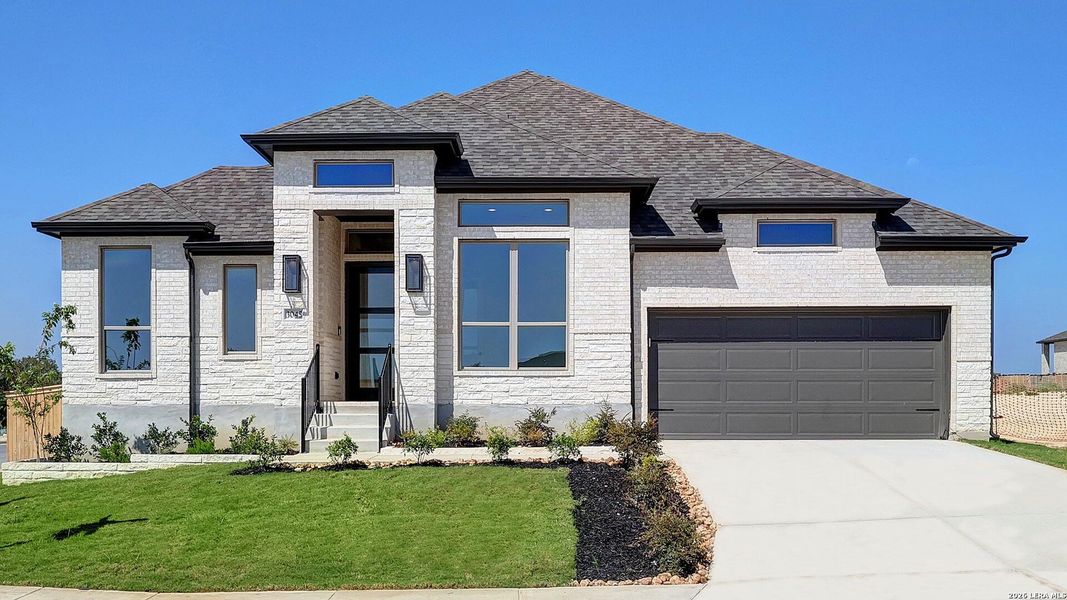 Front exterior of a new home in Ladera, San Antonio, TX, highlighting curb appeal (Image 2).