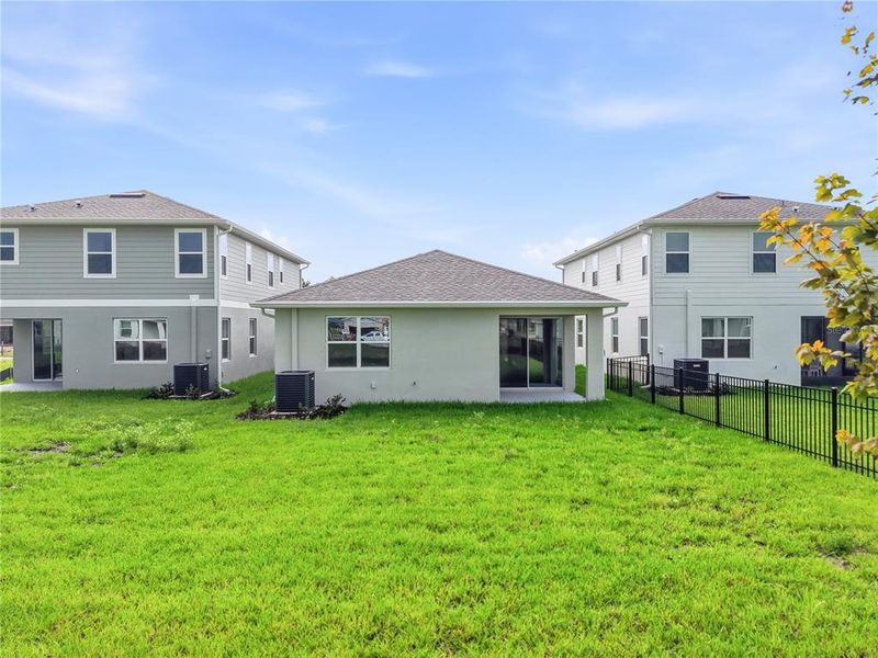 Exterior details and patio area of a home in Waterset, Apollo Beach (Image 24).