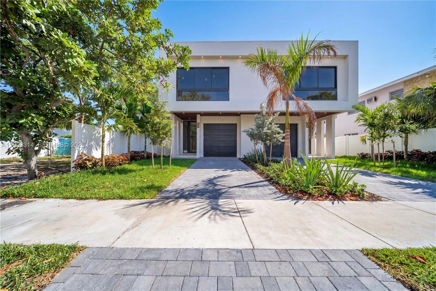 Front exterior of a new home in , Fort Lauderdale, FL, highlighting curb appeal (Image 24). Front exterior of a new home in , Fort Lauderdale, FL, highlighting curb appeal (Image 24).