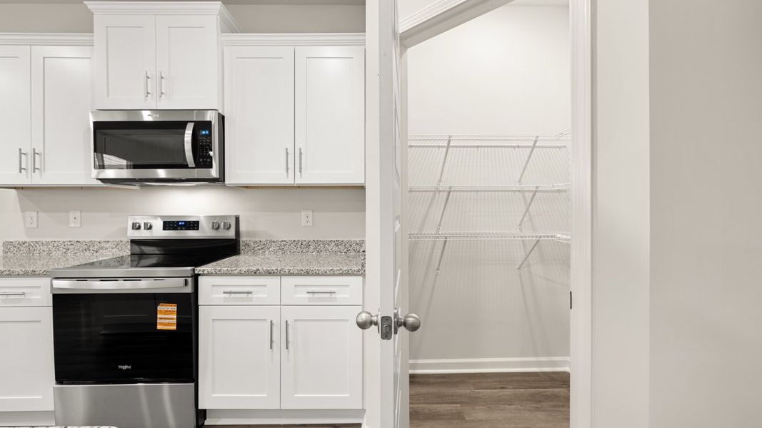 Furnished interior view inside a new home in Southwind Village, Evans (Image 6).