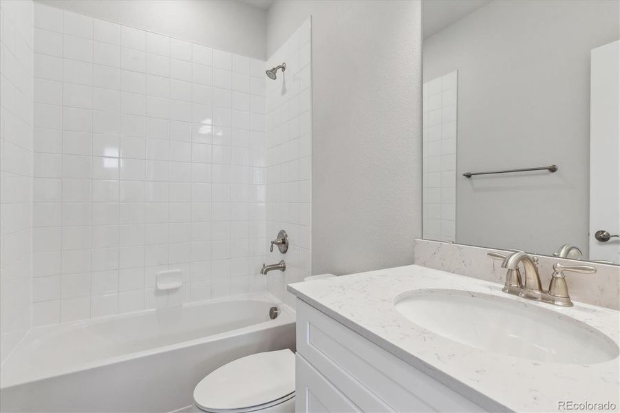 Furnished interior view inside a new home in Townhome Collection at Grand Vue at Interlocken, Broomfield (Image 6).