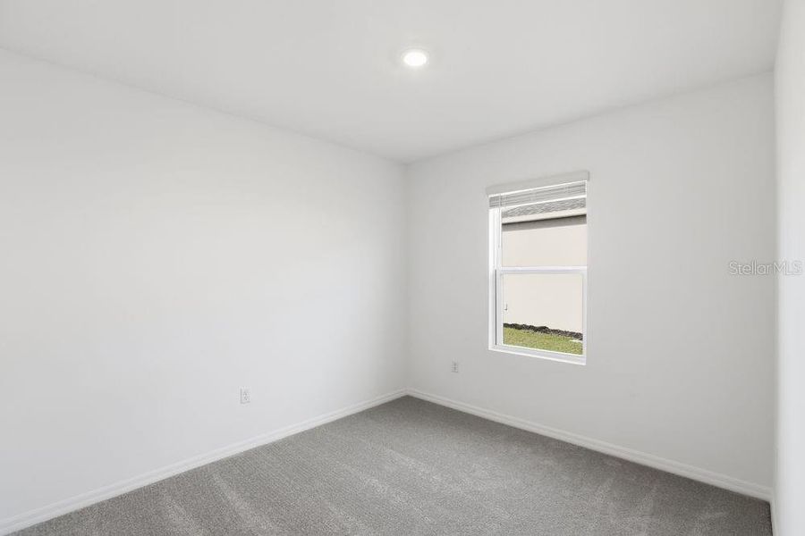 Spacious, unfurnished interior of a new home in Marion Creek, Haines City (Image 25).