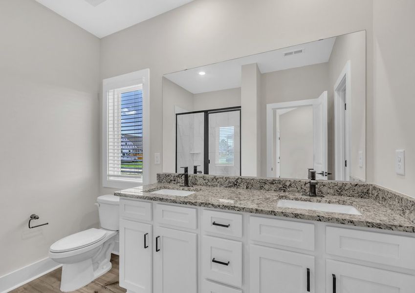 The master bathroom has granite countertops. The master bathroom has granite countertops.